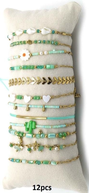 Stainless steel armbandjes op kussen klein groen - Koosvanderbeek.nl - koosvanderbeek - Haarmode